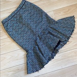 Tweed skirt with ruffle bottom